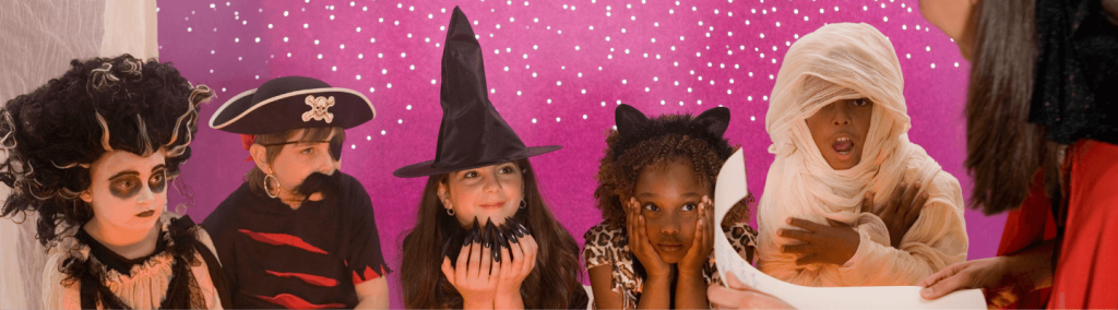 children in various Halloween costumes